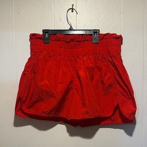 Red athletic shorts size L